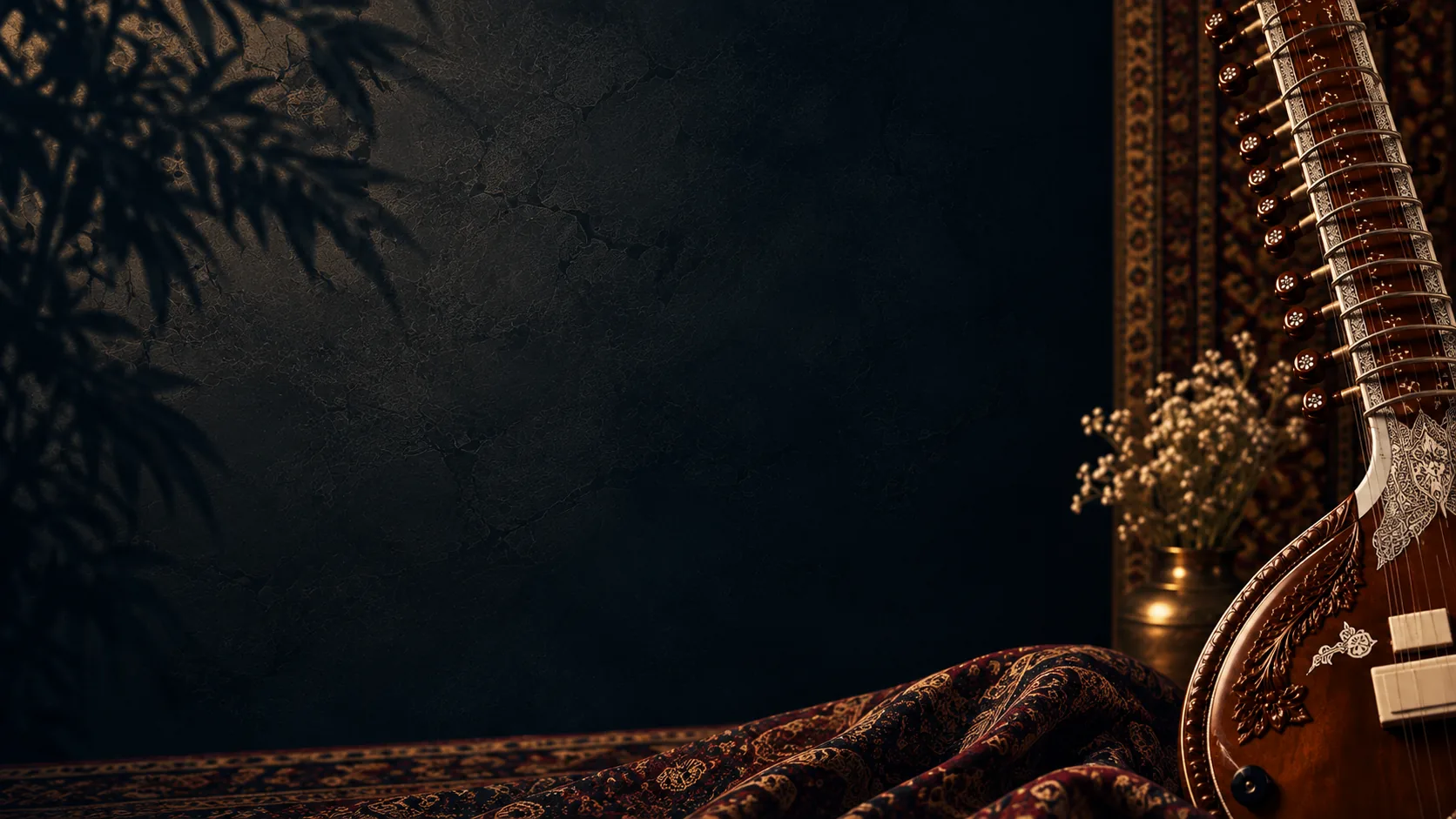 A sitar resting beside patterned textiles and a small flower arrangement, set against a dark, textured wall